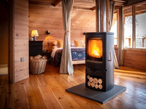 The Lookout Treehouse bed and stove